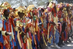 Rara band in cloth strip costume, in the style of the Artibonite Valley.